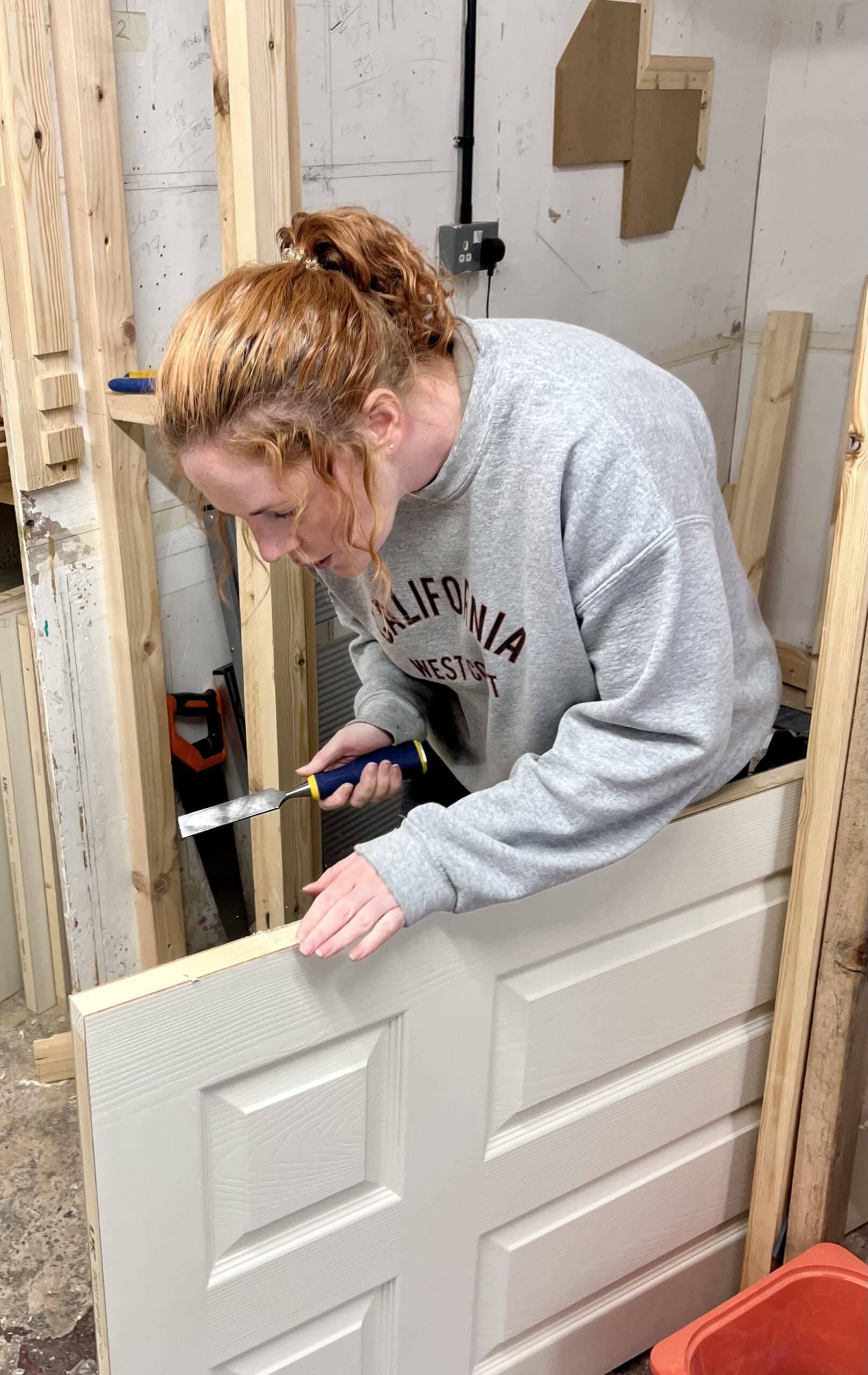 Lady cutting our for hinge