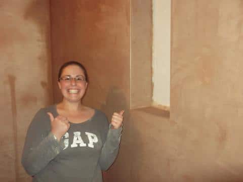 Lady on plastering course happy with her work