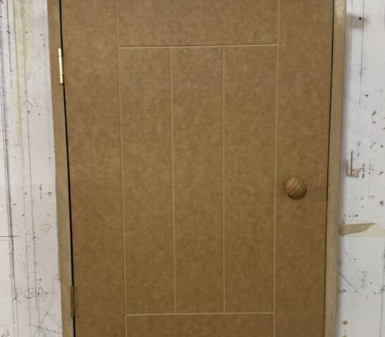 cabinet with door closed with magnetic catch built by someone on a carpentry course
