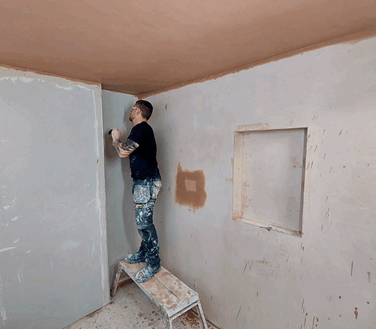 person skimming a ceiling