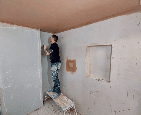 person skimming a ceiling