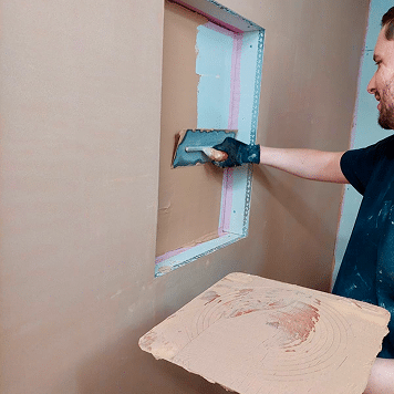 person skimming a niche