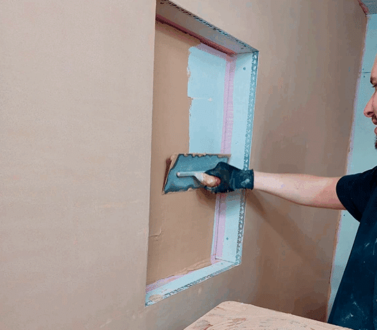 person skimming a niche