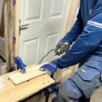 person using coping saw