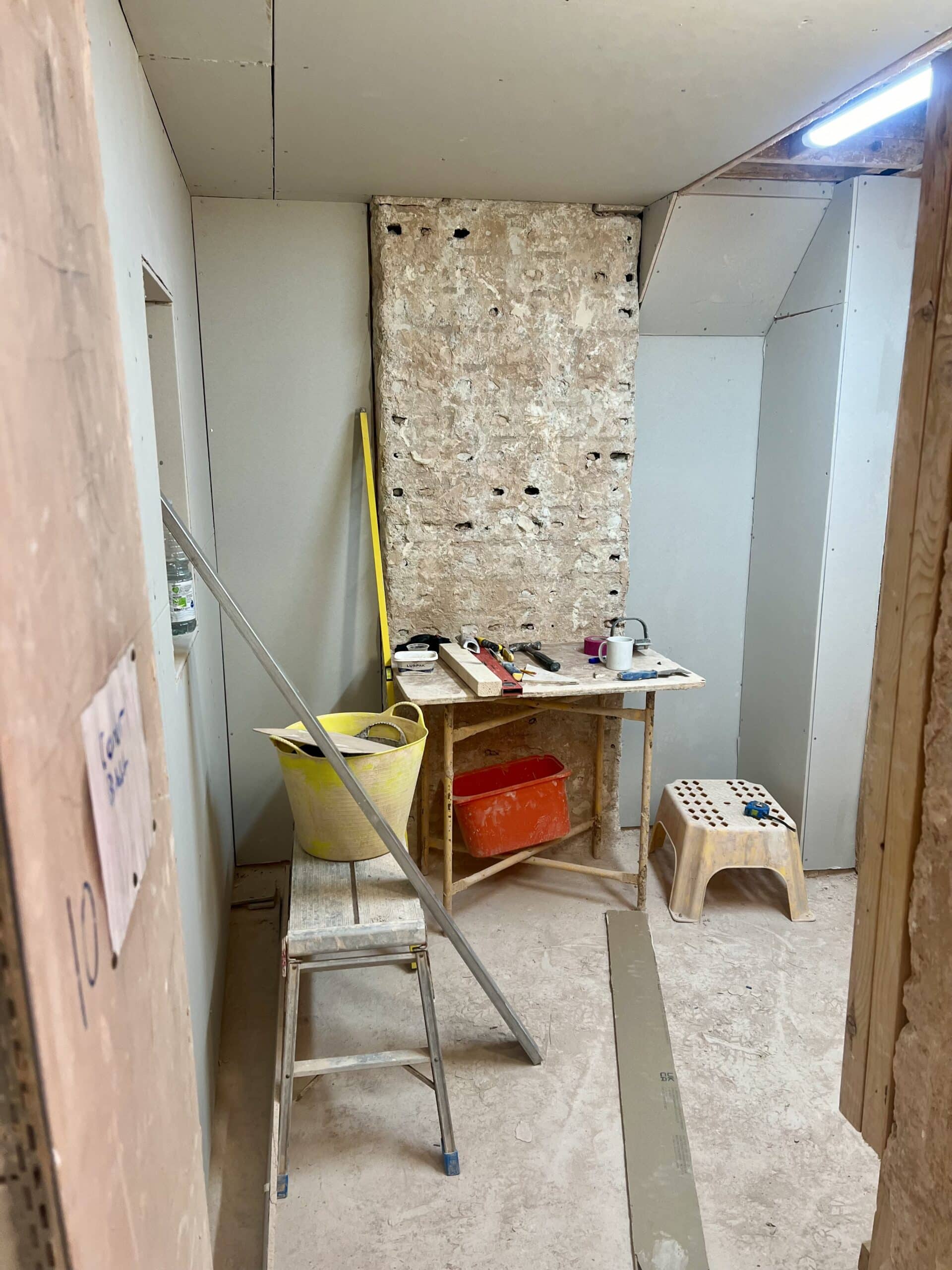 plastering training bay with stud walls and ceiling plaster boarded