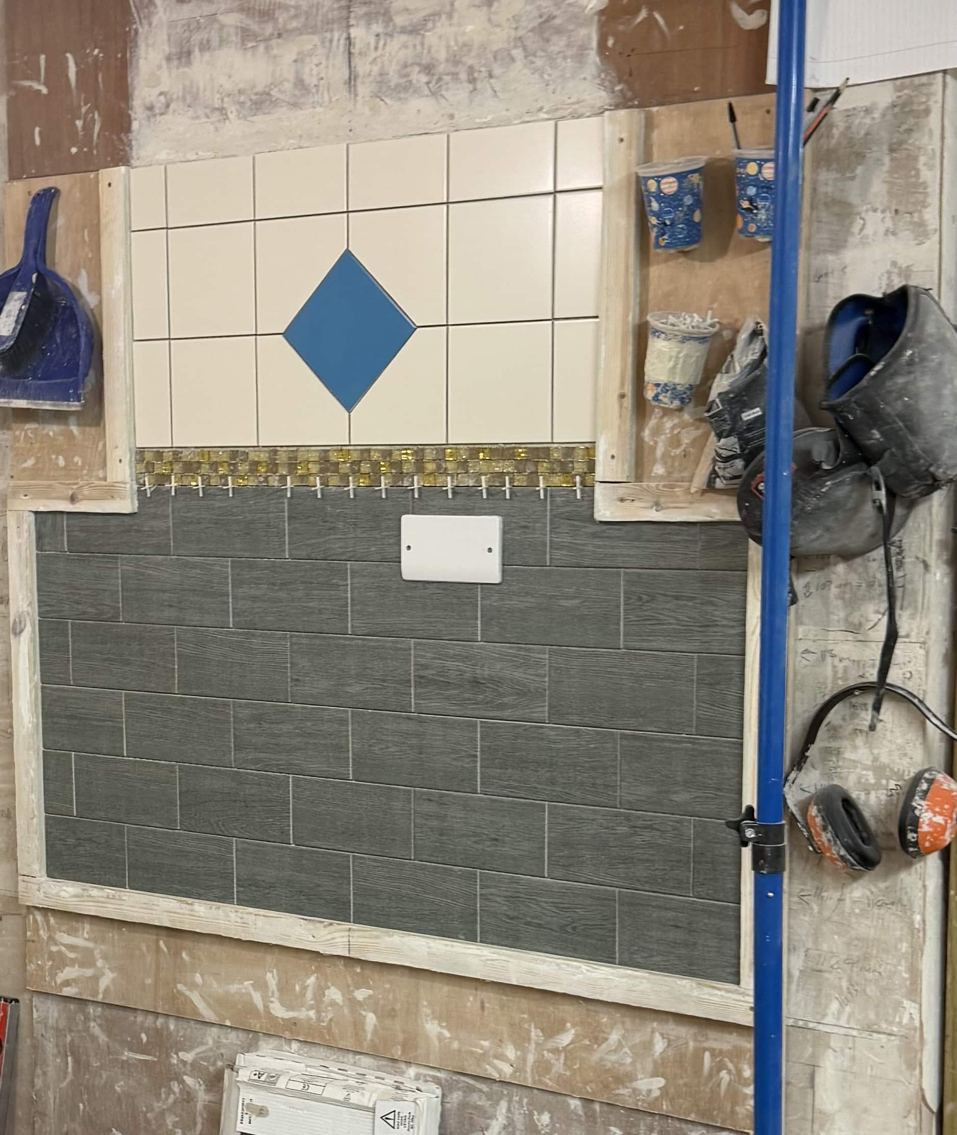 brick wall effect tiling on course in Stoke-on-Trent