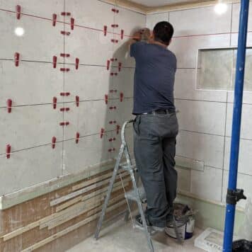 Person completing expert tiling on a course in Stoke-on-Trent