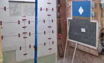 Spacious individual tiling training bays at Construction Skills College