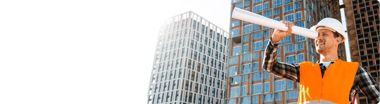 a person looking through their plans at a building